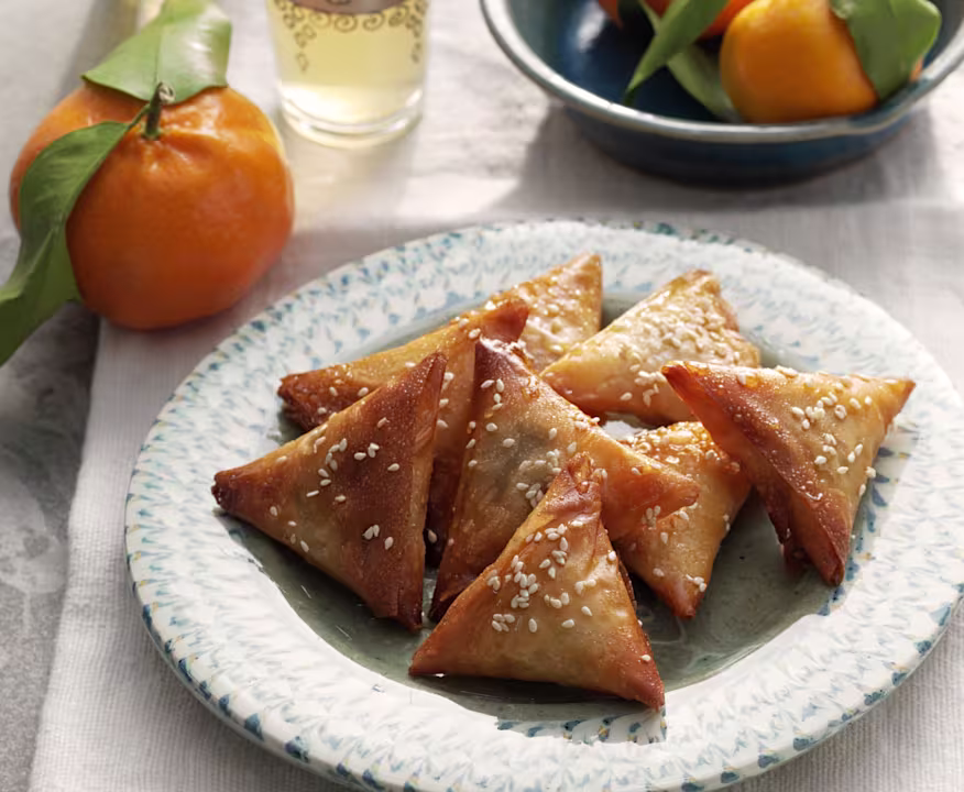 Traditional Moroccan Briouat served on a decorative Moroccan plate