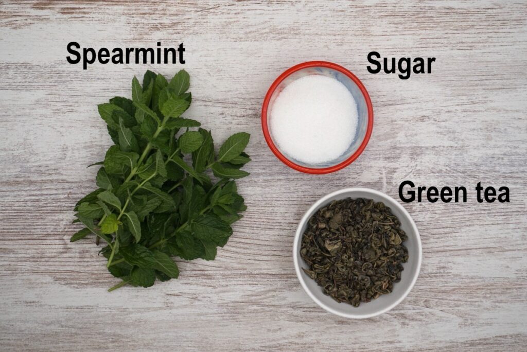 ingredients for moroccan mint tea recipe with fresh mint and green tea