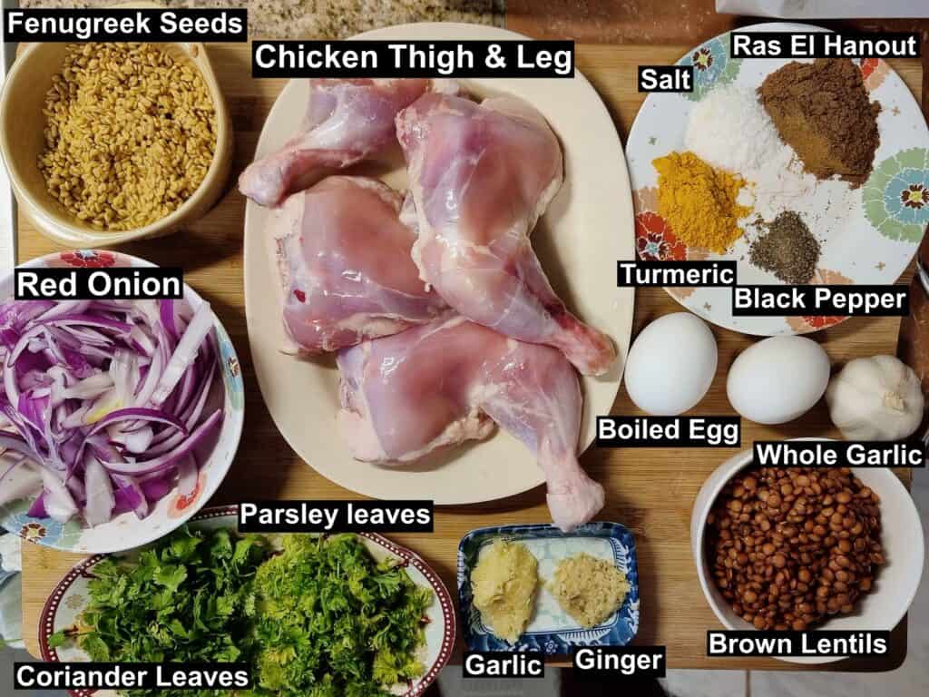 Raw ingredients for Moroccan rfissa including chicken, lentils, onions, and Moroccan spices
