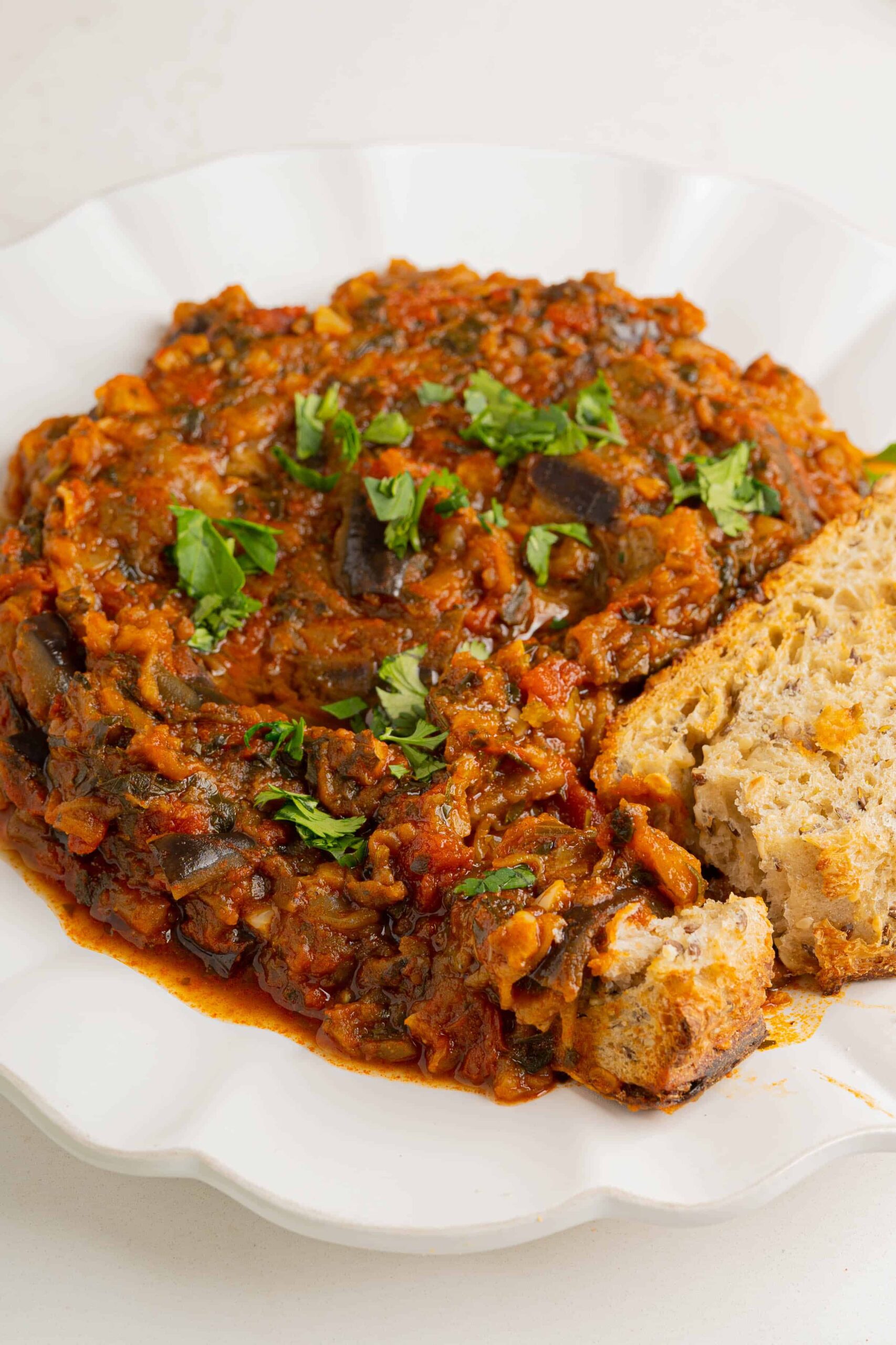 Traditional Moroccan zaalouk made with roasted eggplant, tomatoes, garlic, and olive oil