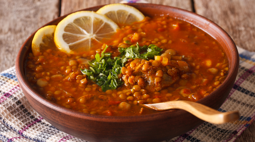 traditional moroccan harira soup served with dates and bread